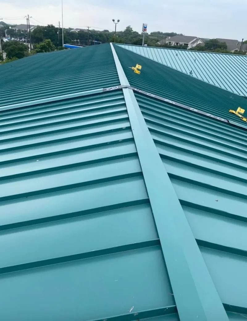 Green commercial metal roof ridge and valley for Metal Roof Repair in Franklin